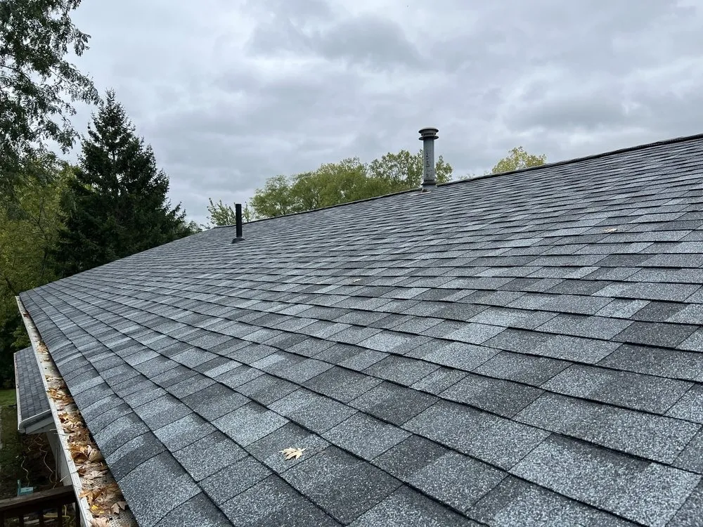 Slide of The Roofing Company Owned by Y&Z