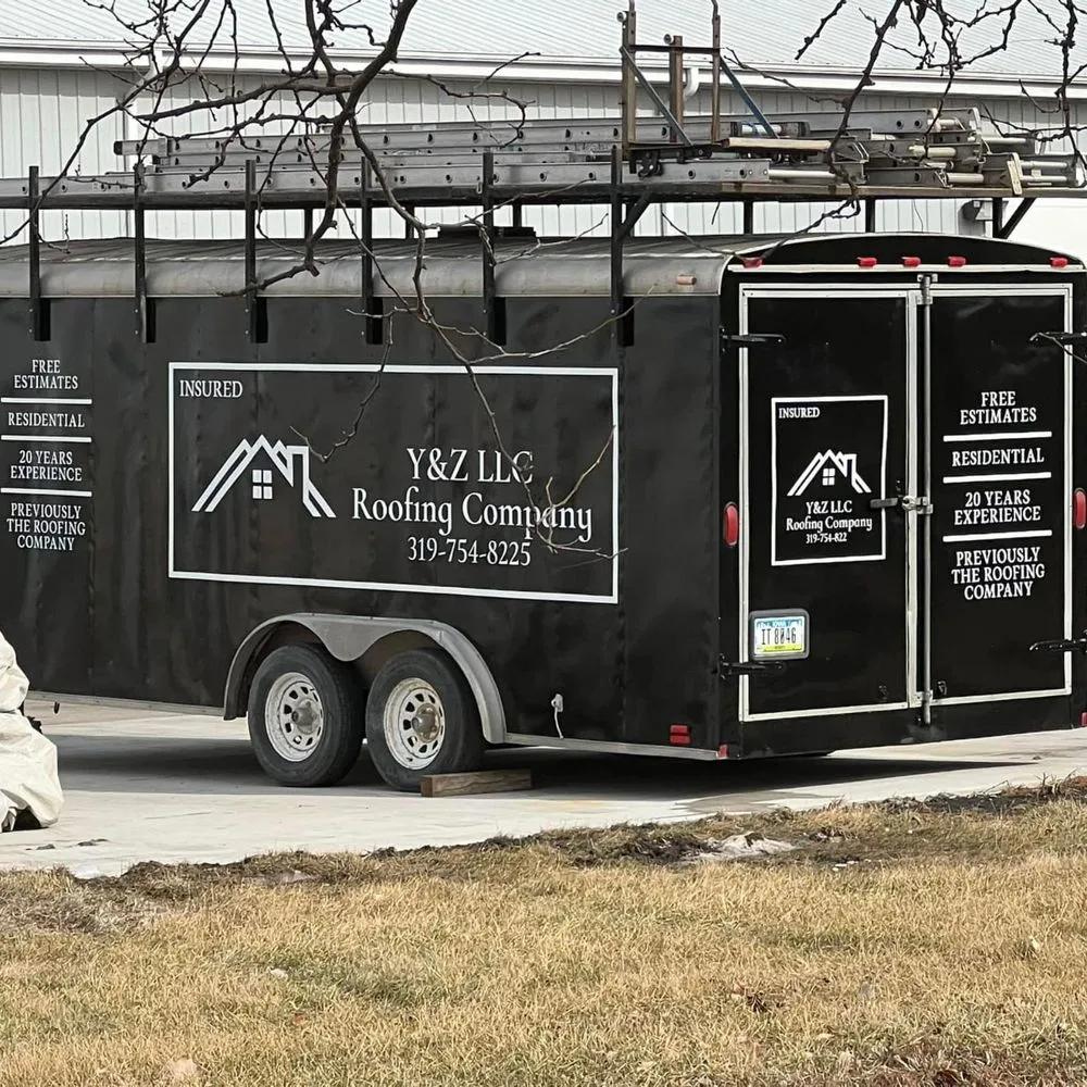 Slide of The Roofing Company Owned by Y&Z