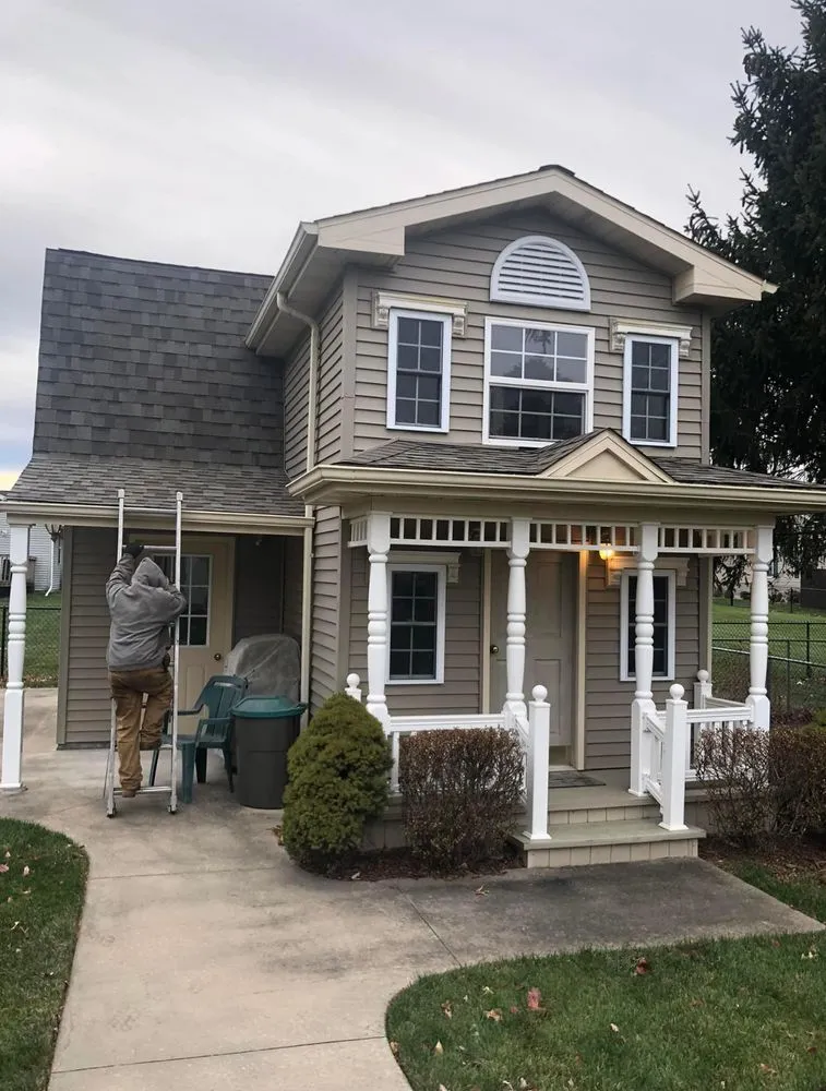 Slide of The Roofing Company Owned by Y&Z