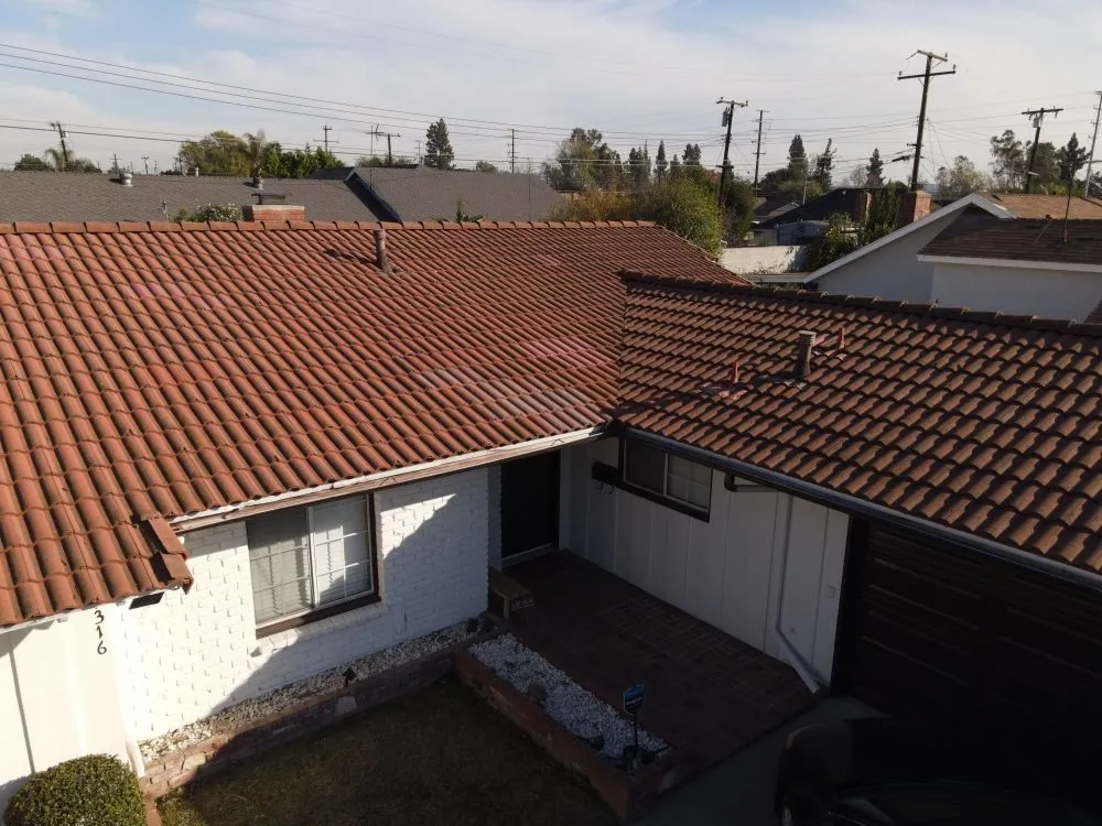 Slide of The Roofing Company