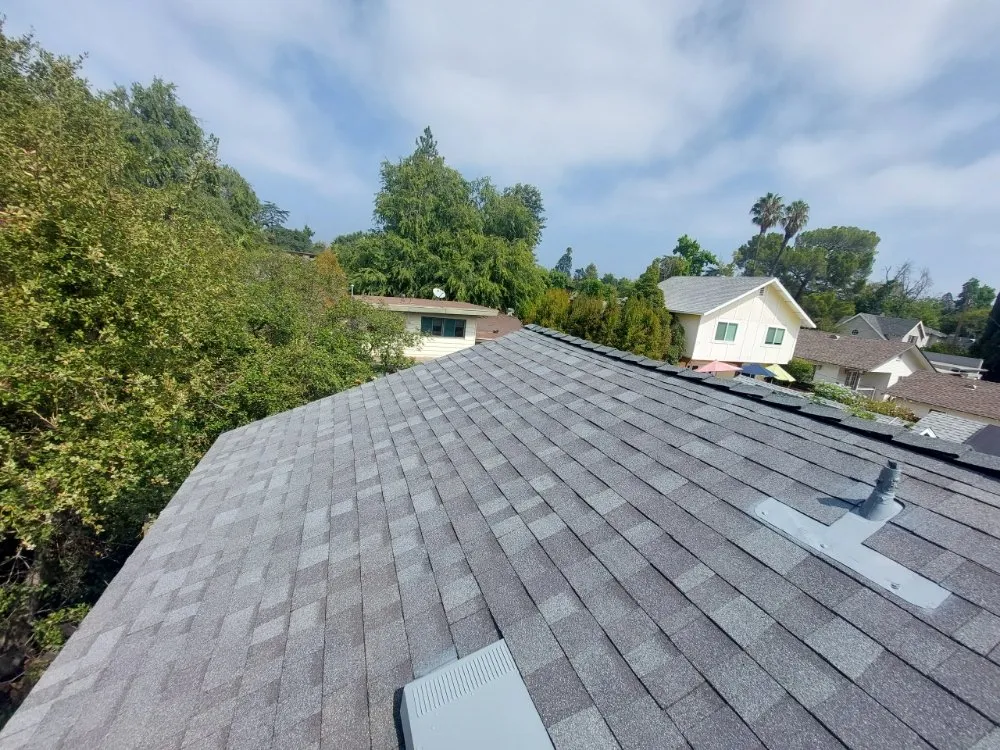 Slide of The Roofing Company