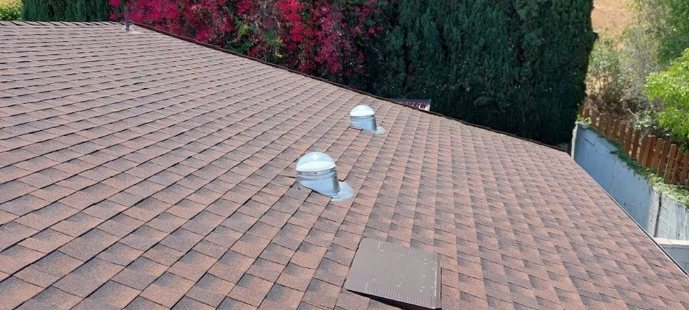 Slide of The Roofing Company