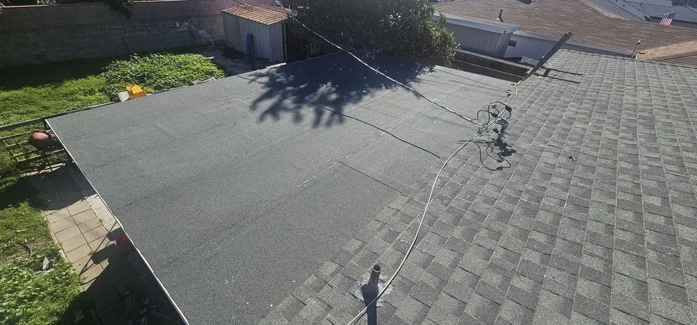 Slide of The Roofing Company