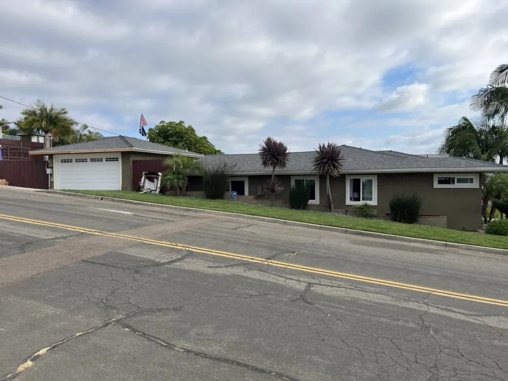 Slide of The Roofing Company