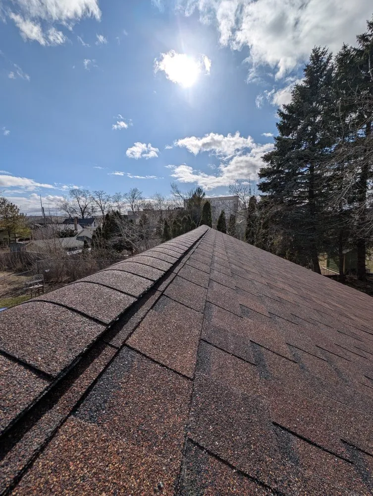 Slide of The Roofing Company