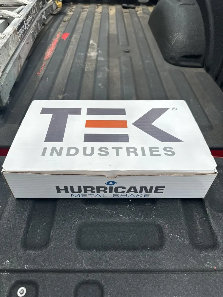 Slide of The Roofing Couple