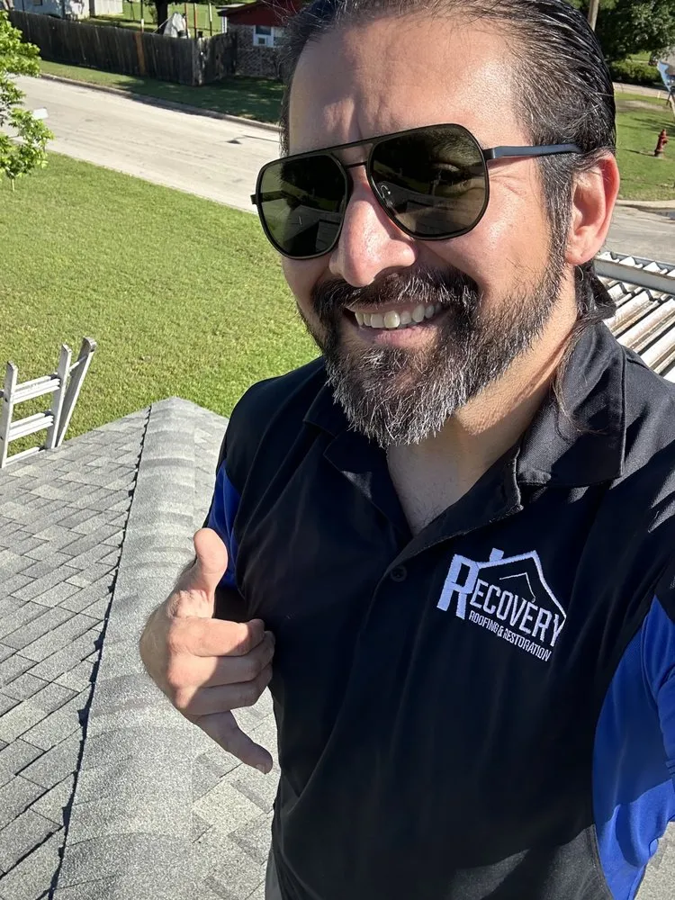 Slide of The Roofing Couple