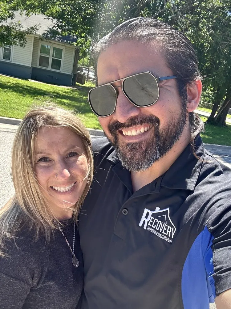 Slide of The Roofing Couple