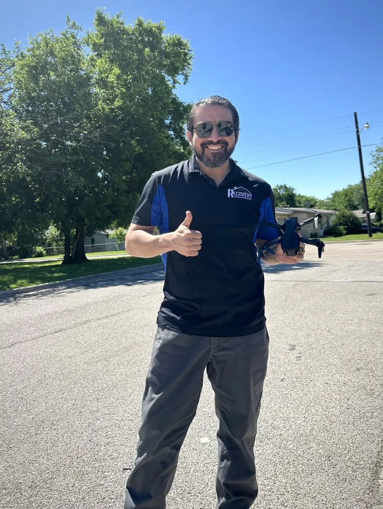 Slide of The Roofing Couple