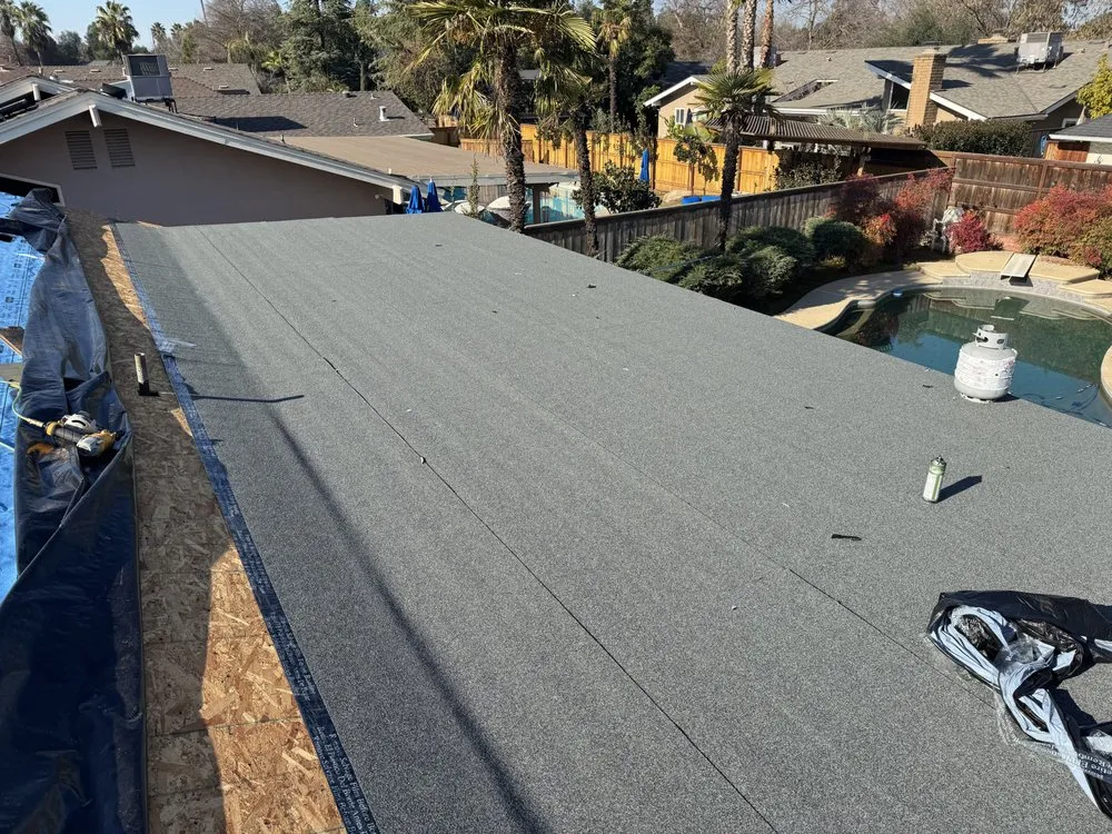 Slide of The Roofing Crew