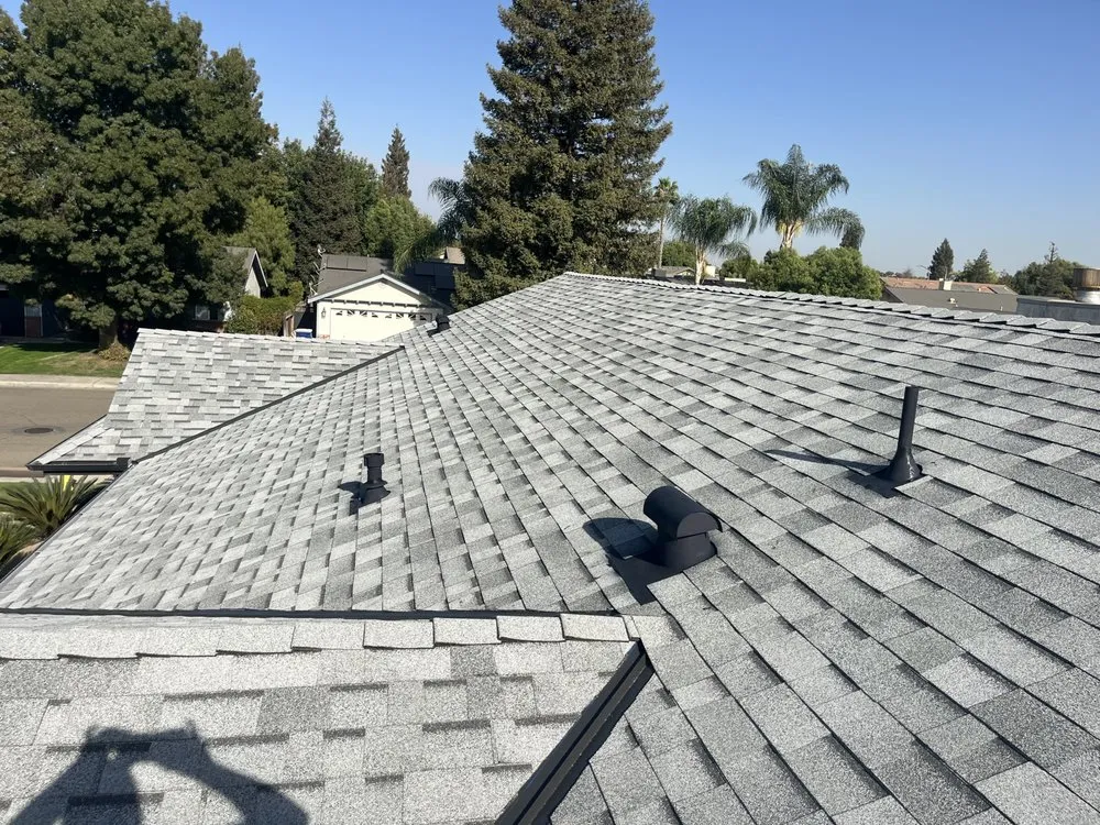 Slide of The Roofing Crew