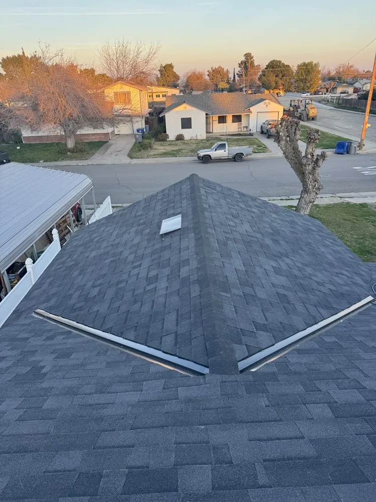 Slide of The Roofing Crew