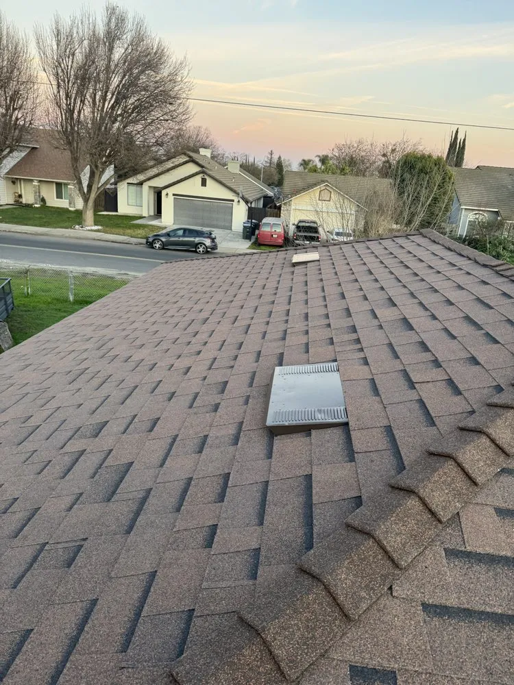 Slide of The Roofing Crew