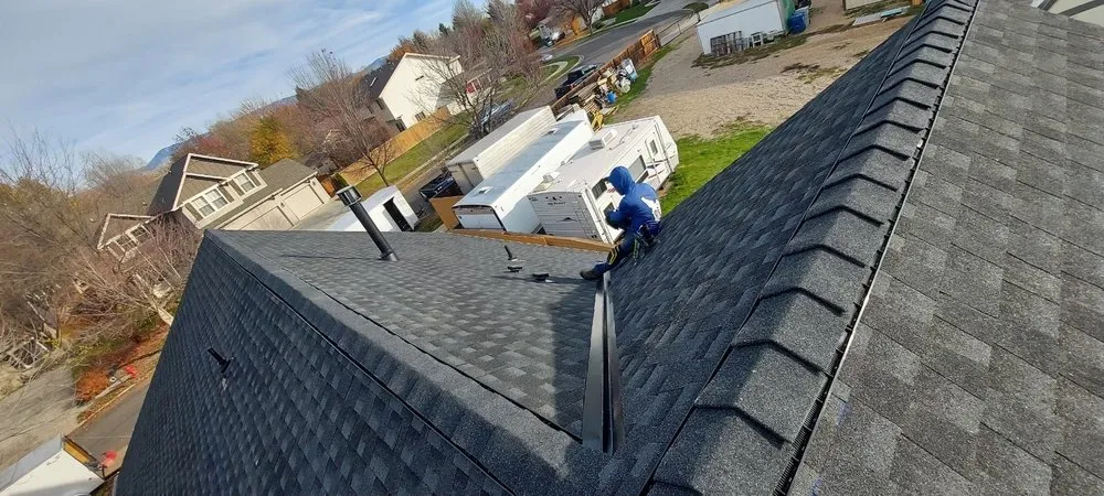 Slide of The Roofing Experts