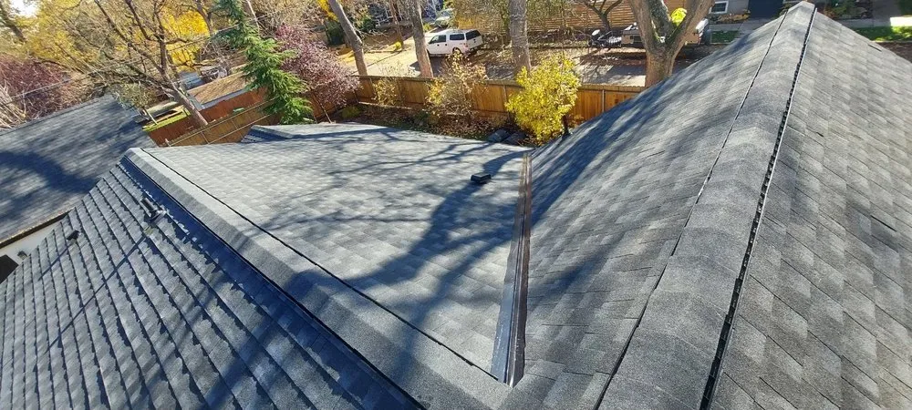 Slide of The Roofing Experts