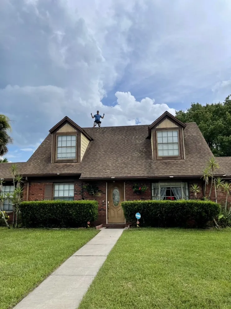 Slide of The Roofing Experts