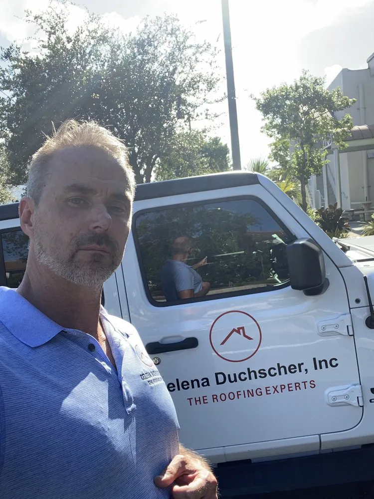 Slide of The Roofing Experts