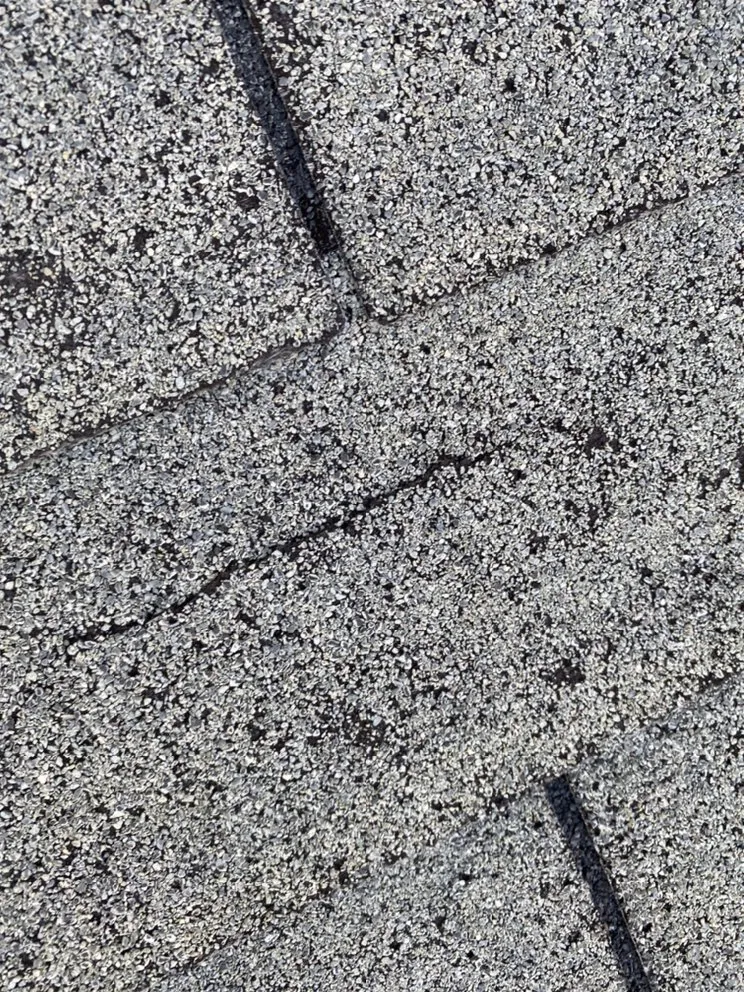 Slide of The Roofing Experts