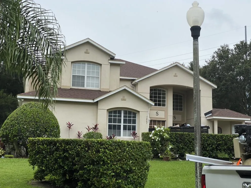 Slide of The Roofing Experts