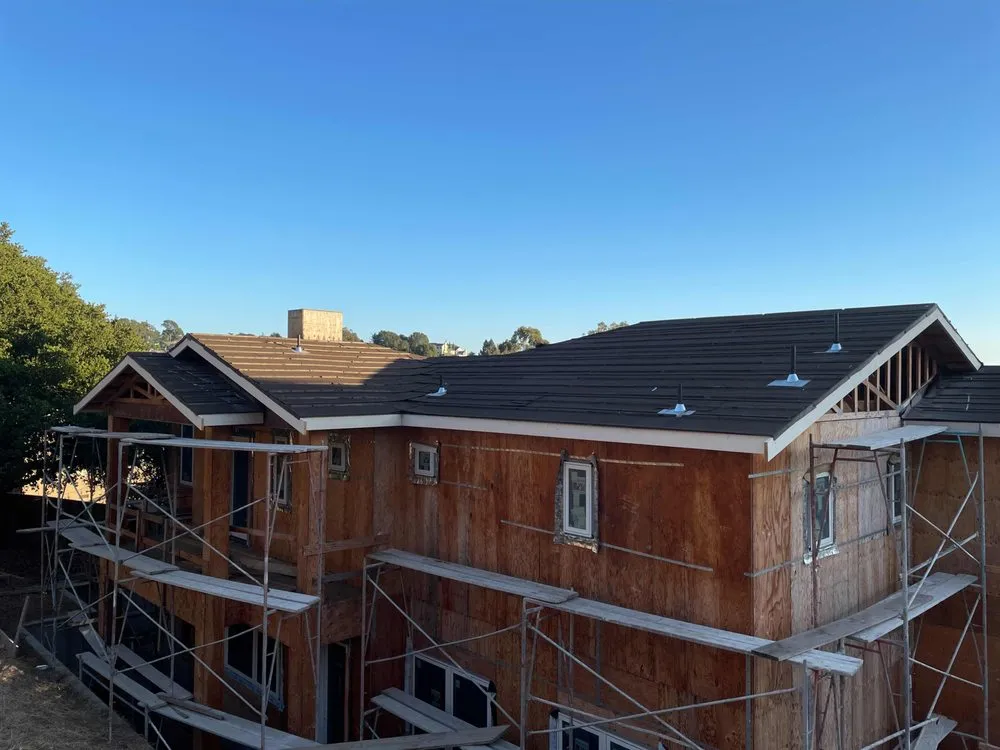 Slide of The Roofing Friend