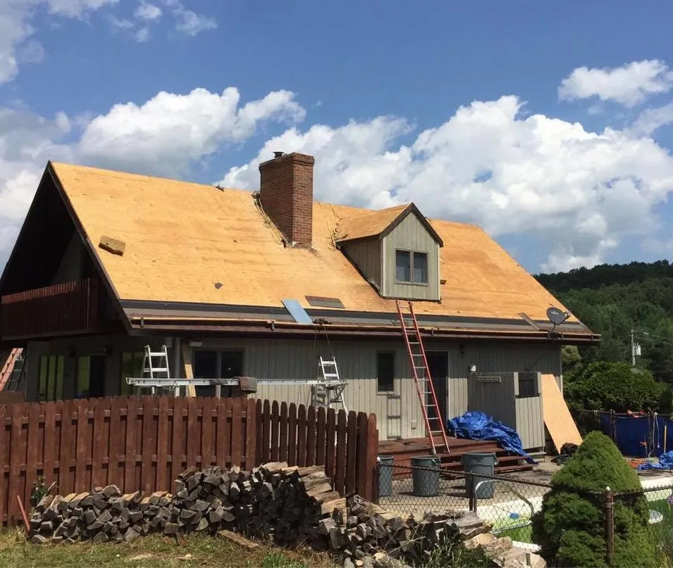 Slide of The Roofing Guys