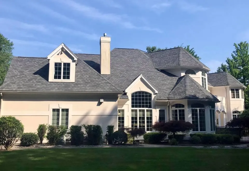 Slide of The Roofing Guys