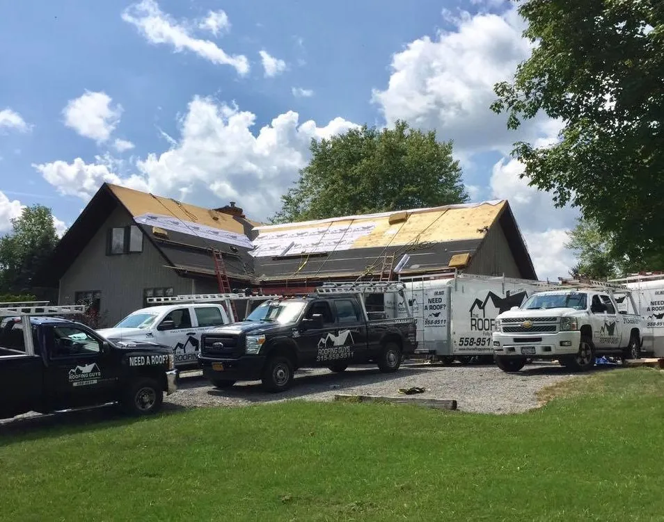 Slide of The Roofing Guys