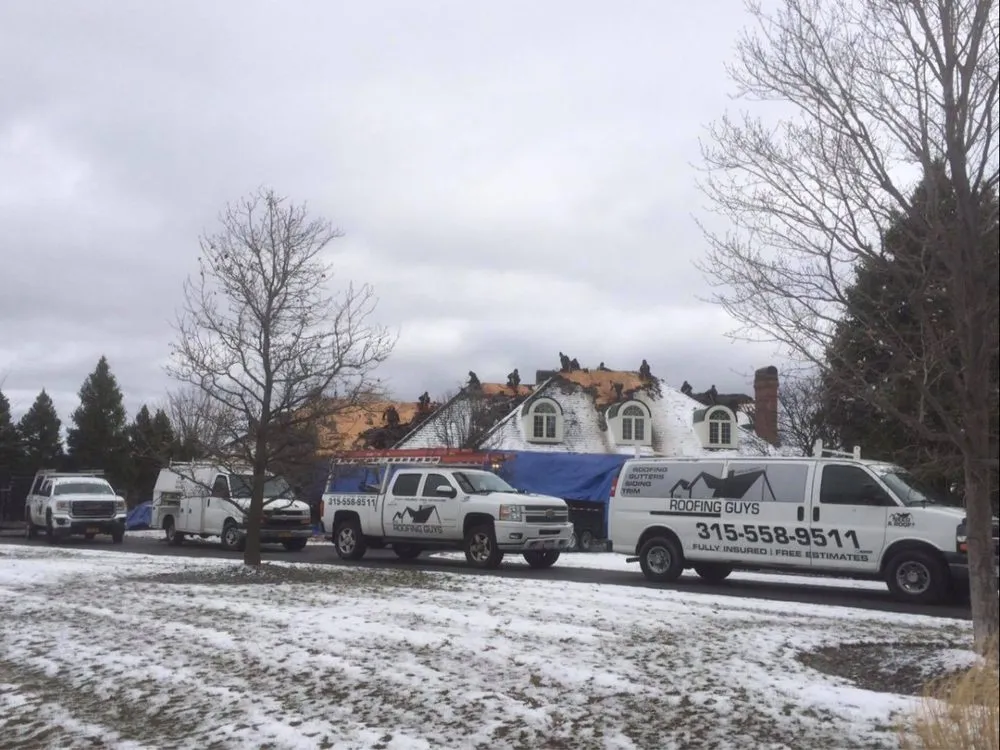 Slide of The Roofing Guys