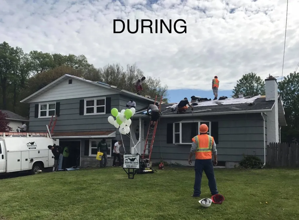 Slide of The Roofing Guys