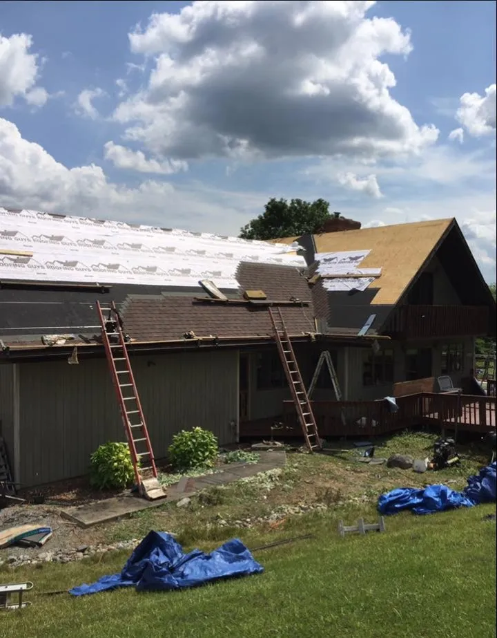 Slide of The Roofing Guys