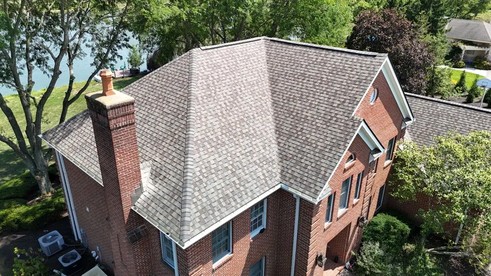 Slide of The Roofing Guys