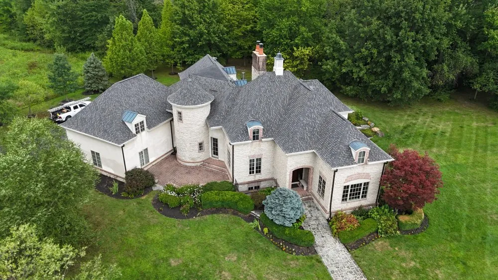 Slide of The Roofing Guys