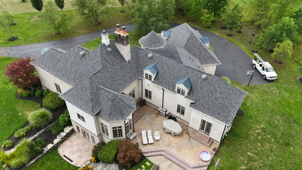 Slide of The Roofing Guys