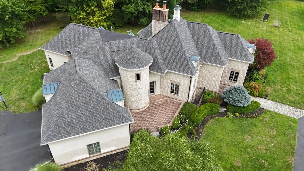 Slide of The Roofing Guys