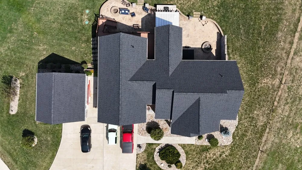 Slide of The Roofing Guys