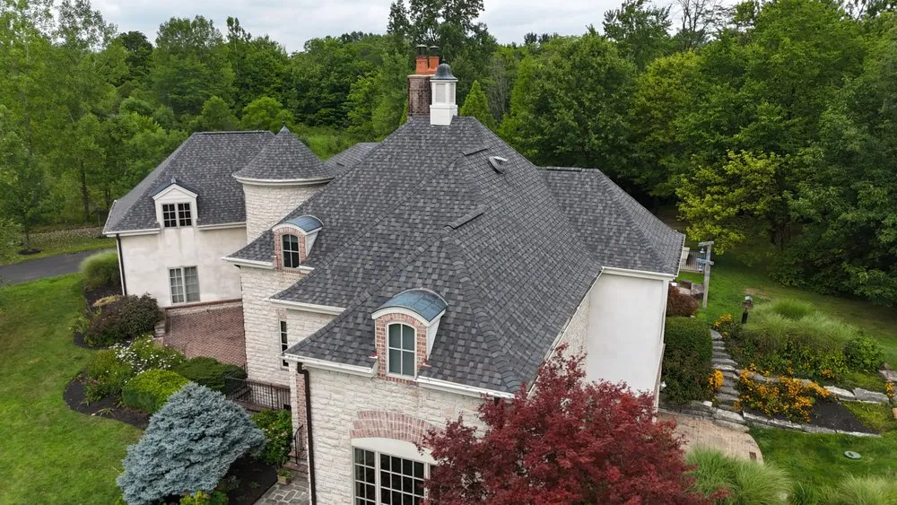 Slide of The Roofing Guys