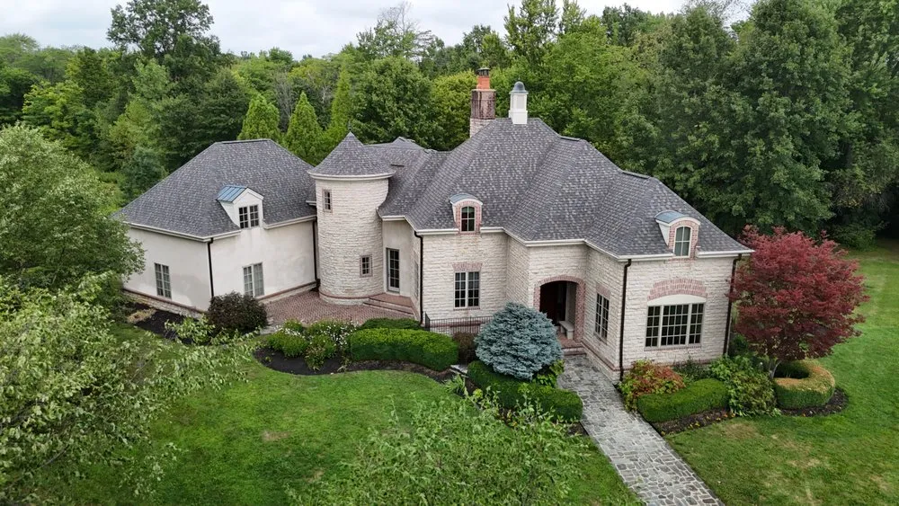 Slide of The Roofing Guys