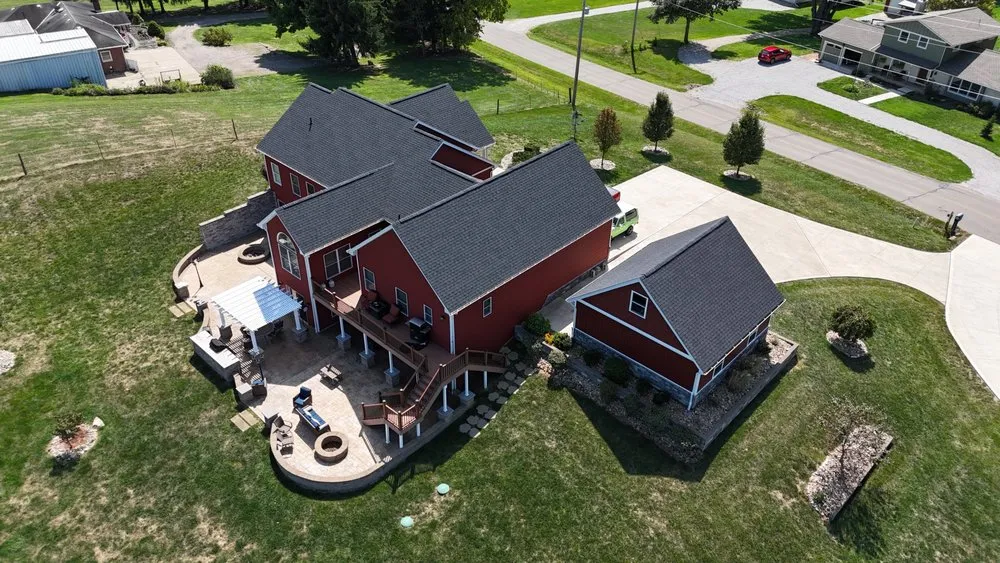 Slide of The Roofing Guys