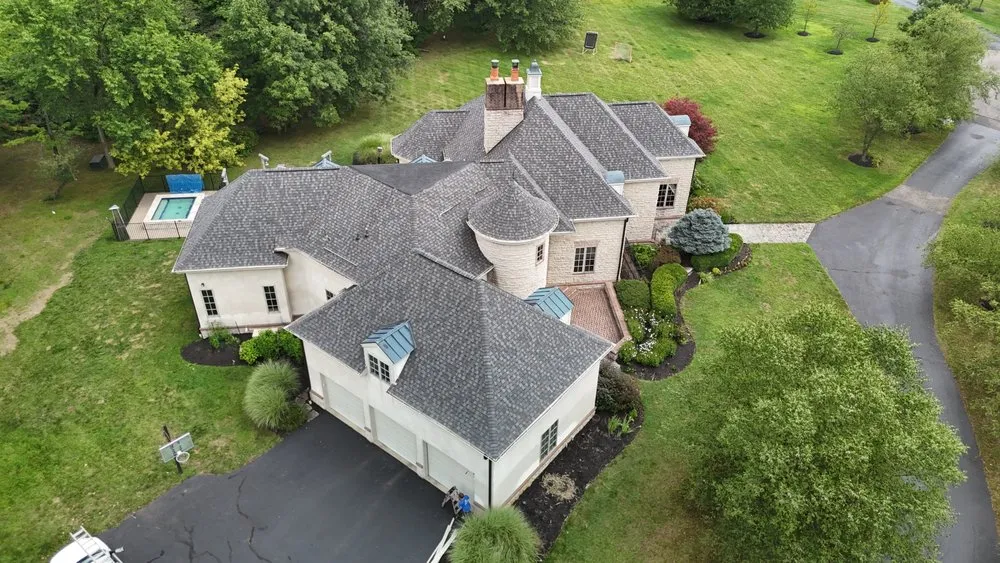 Slide of The Roofing Guys