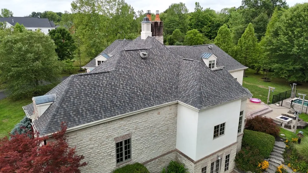 Slide of The Roofing Guys