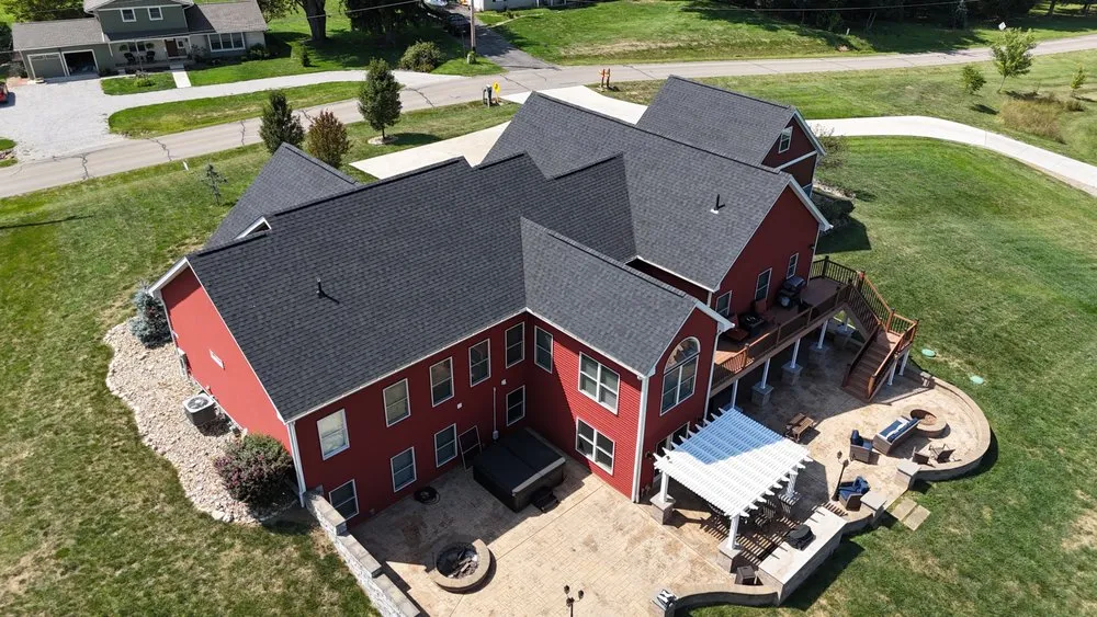 Slide of The Roofing Guys