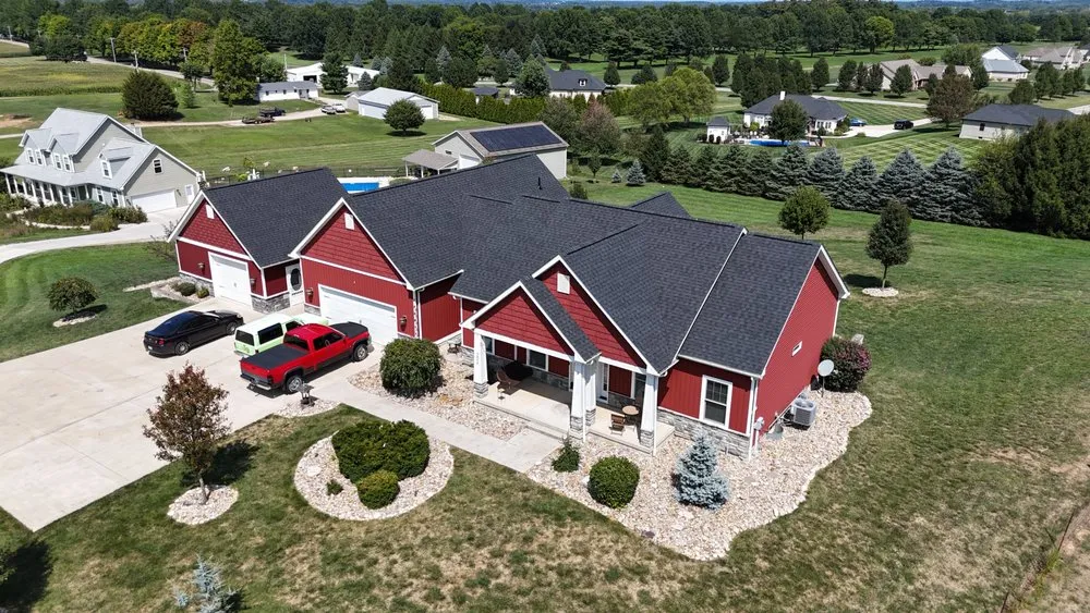 Slide of The Roofing Guys