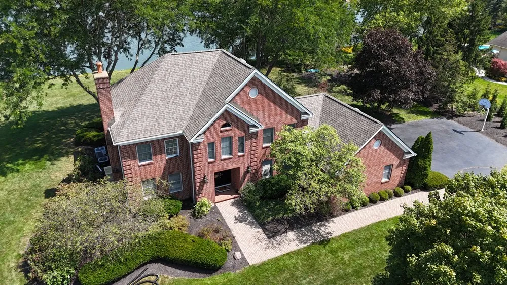 Slide of The Roofing Guys