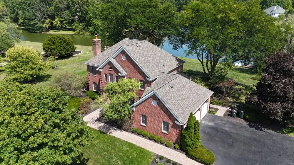 Slide of The Roofing Guys