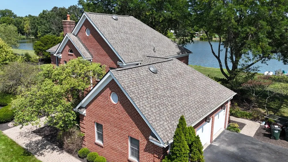 Slide of The Roofing Guys