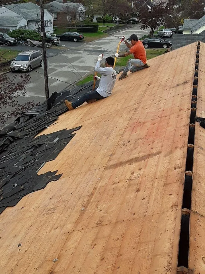 Slide of The Roofing Guys