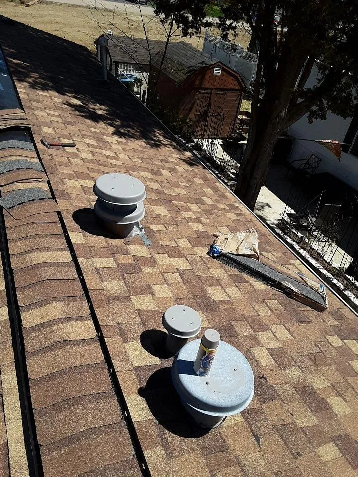 Slide of The Roofing Guys
