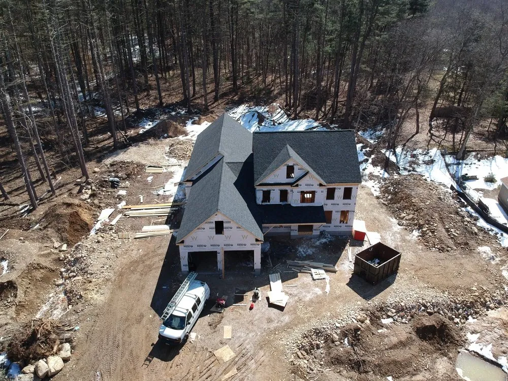 Slide of The Roofing Guys