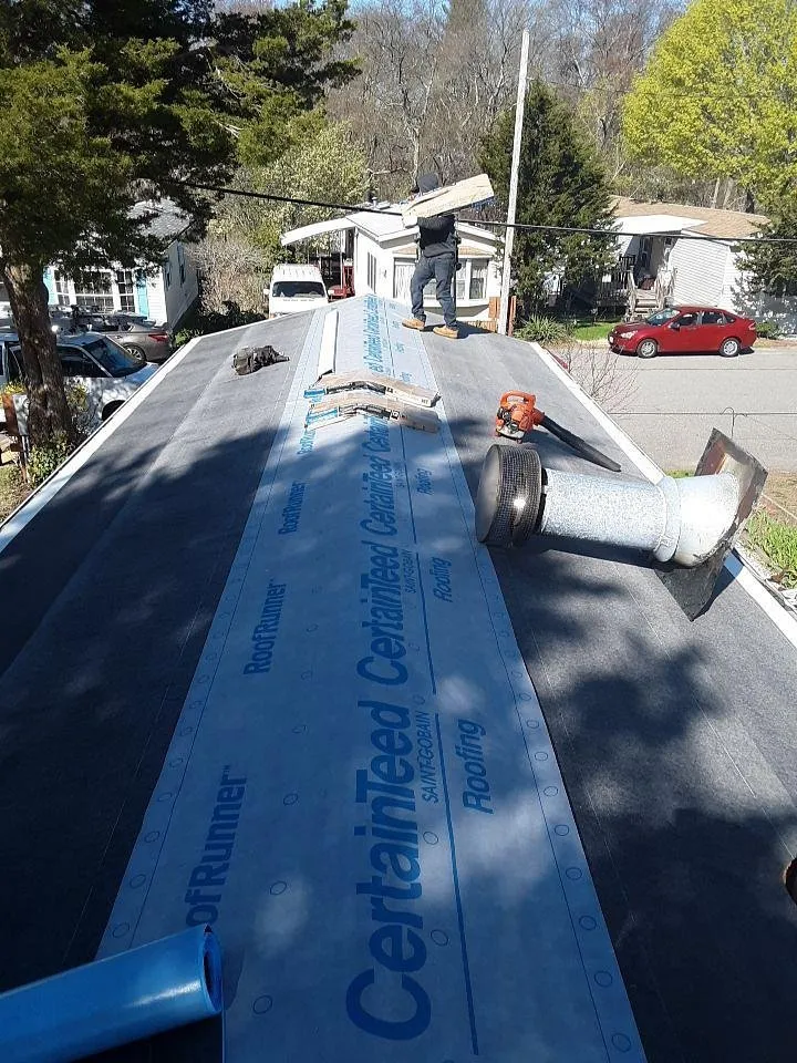 Slide of The Roofing Guys