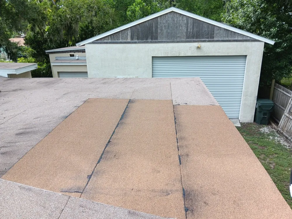 Slide of The Roofing Guys